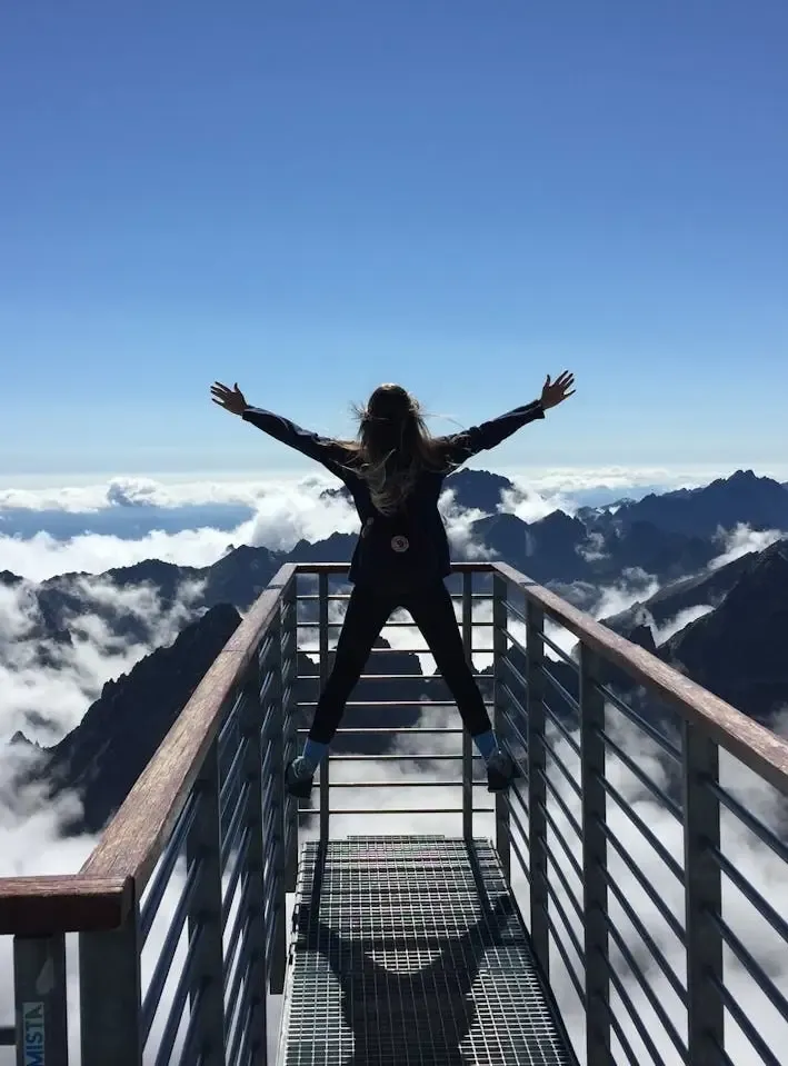 Lady on the top of the mountains